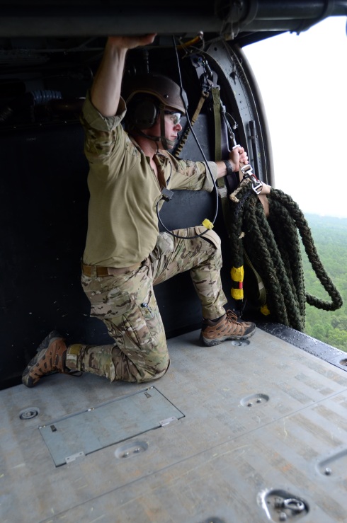 US Special Forces fast rope on target
